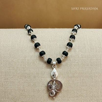Karungali Mala with a silver-plated Lord Murugan Vel and Om symbol pendant