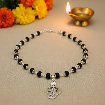 Karungali Mala with a silver-plated Lord Murugan Vel and Om symbol pendant