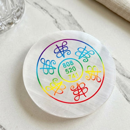 Selenite Charging Plate engraved with a powerful Zibu Healing Symbol